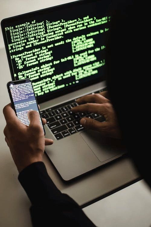 A hacker copying a person’s content