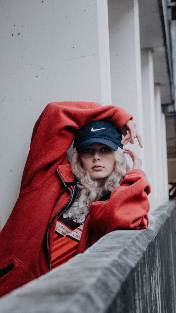 A woman wearing a Nike cap