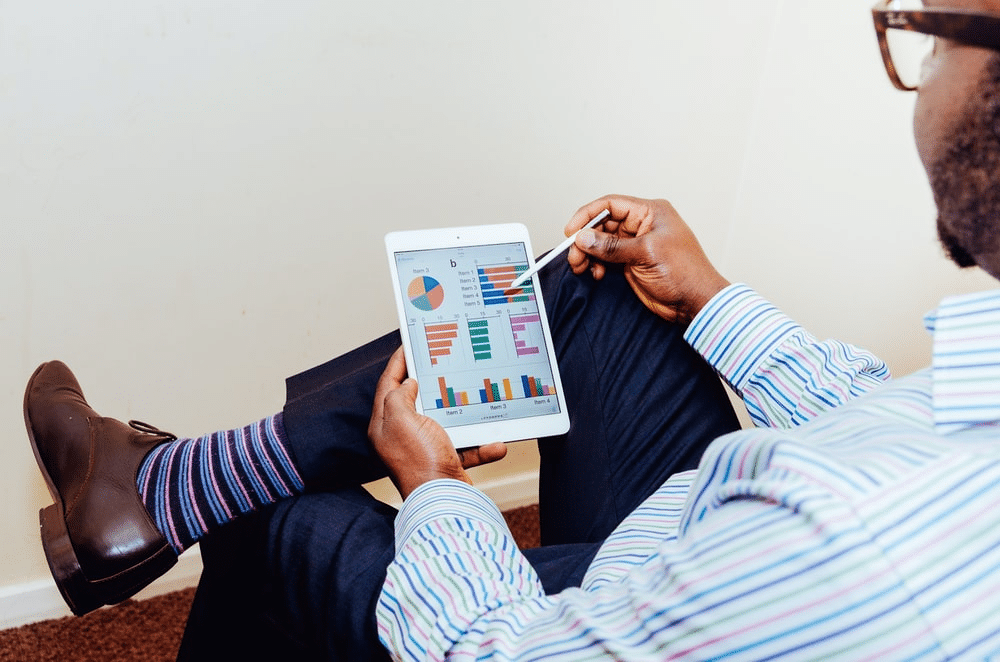 A man checking a sales report
